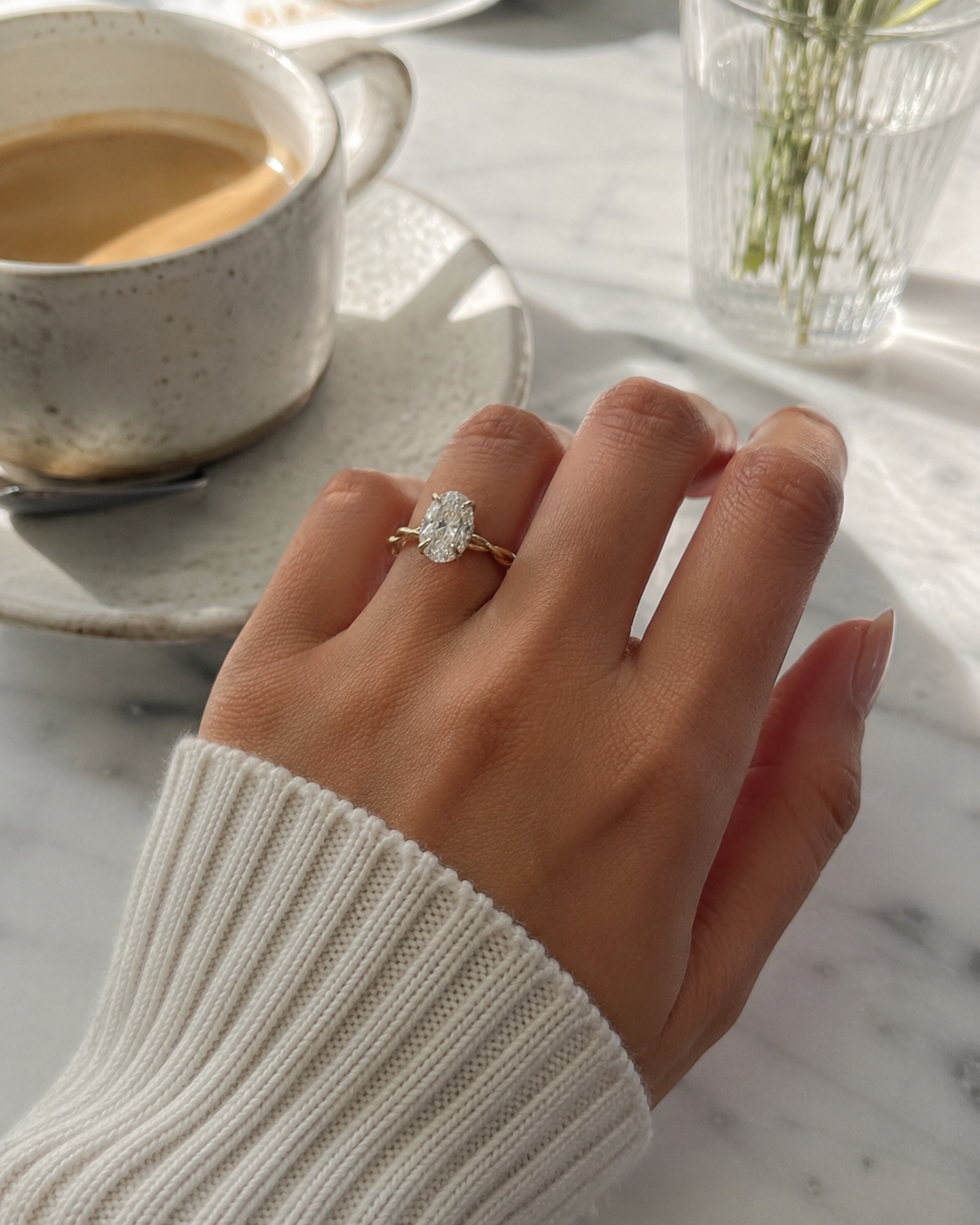 June Oval Twist Solitaire Halo Ring